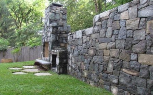 Fireplace Integrated with Stone Wall