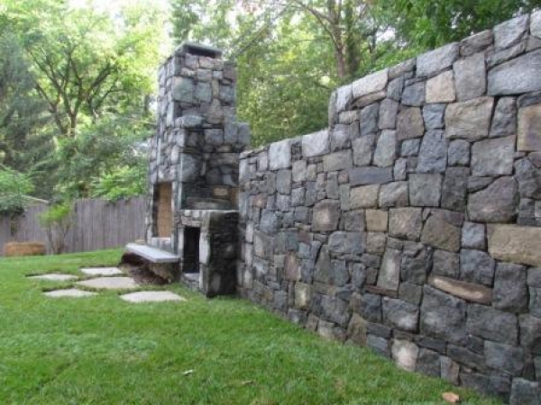 Fireplace Integrated with Stone Wall