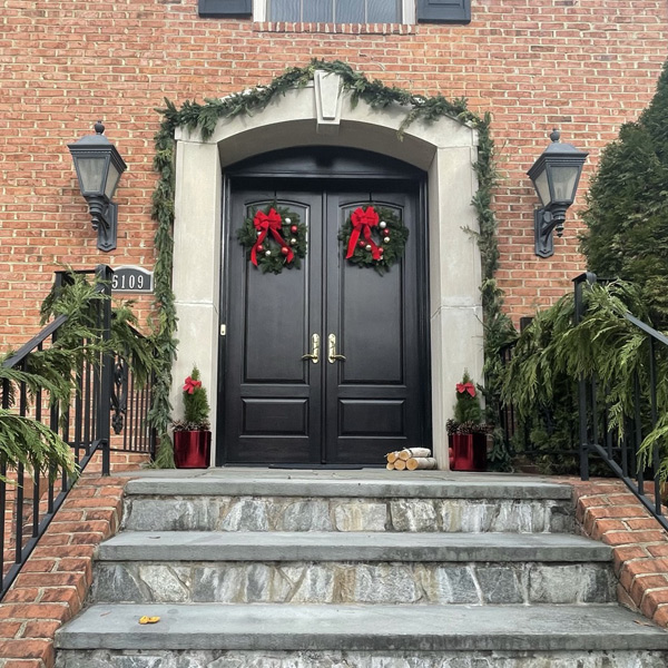 Festive Holiday decorations at front door