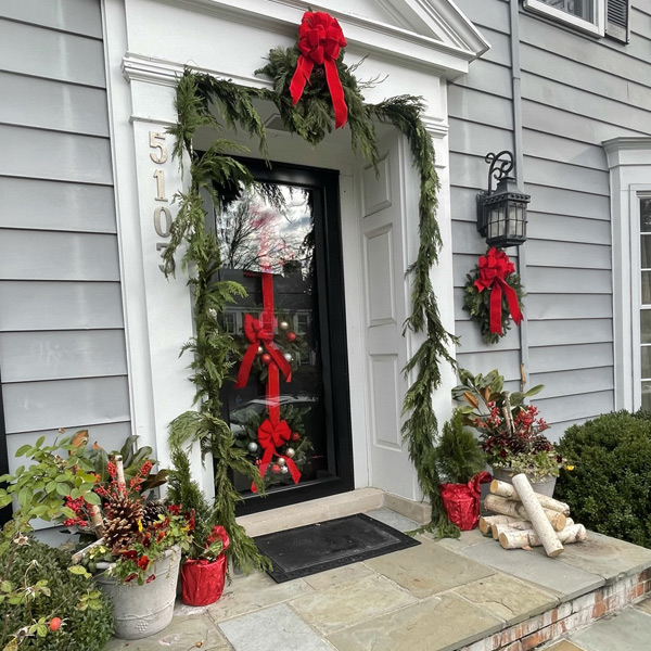 Festive Holiday decorations at front door